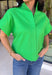This kelly green short sleeve shirt is the kind of spring staple that instantly brightens up your whole outfit. The crisp color feels fresh and fun, while the hidden button down design keeps the look clean, polished, and effortlessly put-together. Made from a breathable cotton-linen blend, it’s lightweight enough for warmer days but still structured enough to wear to work, brunch, or wherever your calendar takes you. Just add denim and you’re good to go!