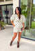 Classic polka dots and effortless style come together in this adorable two-piece set from Mable. Featuring an off-white and black polka dot print, this coordinating outfit is as versatile as it is charming. The short sleeve top is designed with feminine puff sleeves, a single button closure at the front, and a sweet tie detail at the back for an elevated finish. The matching shorts feature a comfortable elastic waistband, side zipper closure, and functional side pockets.