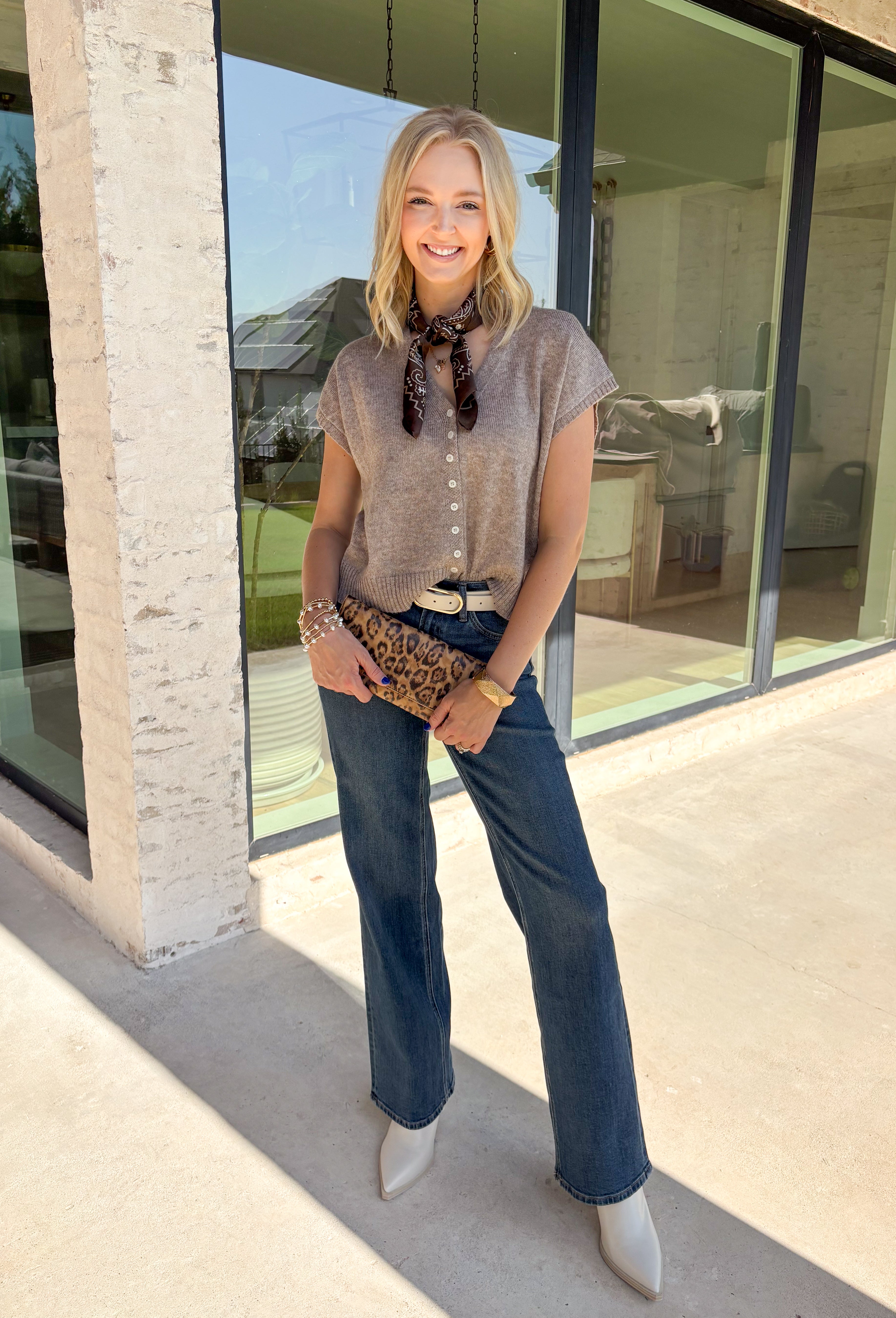 Wrap yourself in everyday luxury with this irresistibly soft mocha cardigan. Crafted from an ultra-cozy knit blend with hints of silk and cashmere, this timeless layering piece feels just as good as it looks. The flattering v-neckline and classic button-front design make it easy to wear buttoned as a top or layered over your favorite tanks and dresses. 