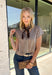 Wrap yourself in everyday luxury with this irresistibly soft mocha cardigan. Crafted from an ultra-cozy knit blend with hints of silk and cashmere, this timeless layering piece feels just as good as it looks. The flattering v-neckline and classic button-front design make it easy to wear buttoned as a top or layered over your favorite tanks and dresses. 