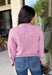Wrap yourself in all the cozy vibes this season with this beautiful knit cardigan! Featuring gorgeous shades of purple woven throughout, this button-down cardigan is the perfect layering piece for crisp autumn mornings and cozy evenings. Front pockets add a practical touch, while the soft knit fabric makes it one you'll reach for again and again. Whether you're heading to brunch, the office, or enjoying a weekend at the pumpkin patch, this cardigan brings effortless comfort and style to every outfit.