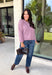 Wrap yourself in all the cozy vibes this season with this beautiful knit cardigan! Featuring gorgeous shades of purple woven throughout, this button-down cardigan is the perfect layering piece for crisp autumn mornings and cozy evenings. Front pockets add a practical touch, while the soft knit fabric makes it one you'll reach for again and again. Whether you're heading to brunch, the office, or enjoying a weekend at the pumpkin patch, this cardigan brings effortless comfort and style to every outfit.
