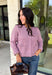 Wrap yourself in all the cozy vibes this season with this beautiful knit cardigan! Featuring gorgeous shades of purple woven throughout, this button-down cardigan is the perfect layering piece for crisp autumn mornings and cozy evenings. Front pockets add a practical touch, while the soft knit fabric makes it one you'll reach for again and again. Whether you're heading to brunch, the office, or enjoying a weekend at the pumpkin patch, this cardigan brings effortless comfort and style to every outfit.