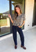 Classic leopard print gets a feminine update in this irresistibly cozy cardigan. Designed with a timeless leopard pattern, this soft sweater knit features charming puff sleeves and a classic button-front silhouette that's as versatile as it is stylish. Wear it buttoned as a top or layered over your favorite tank or tee for endless outfit possibilities. 