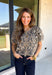 Classic leopard print gets a feminine update in this irresistibly cozy cardigan. Designed with a timeless leopard pattern, this soft sweater knit features charming puff sleeves and a classic button-front silhouette that's as versatile as it is stylish. Wear it buttoned as a top or layered over your favorite tank or tee for endless outfit possibilities. 