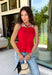 Every fall wardrobe needs a classic red cami, and this one is anything but basic! Designed with chic vertical pleating along the bodice, it adds beautiful texture and an elevated touch to any outfit. The adjustable shoulder straps and smocked back panel provide a comfortable, flattering fit, making it just as easy to wear on its own as it is layered under blazers, cardigans, or jackets. 