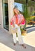 This colorful stripe button down top is bringing all the sunset-inspired summer vibes! With shades of pink and coral, it adds the prettiest pop of color while still feeling soft and easy to style. Lightweight and breathable, it’s perfect for layering over a tank or wearing on its own for an effortless, put-together look. The classic button down design keeps it timeless, while the vibrant stripes make it stand out. 