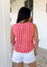 Easy, breezy, and made for sunny days—this red and pink striped tank is the kind of spring staple you’ll reach for on repeat. It’s lightweight, comfy, and effortlessly cute with a classic stripe that never goes out of style. The keyhole closure in the back adds a fun little detail that makes it feel extra special while still keeping it totally everyday-wearable.