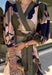 All the colors we love for fall come together in this printed midi dress from Entro. A mix of olive, navy, and tan creates a rich seasonal palette that feels right at home at autumn gatherings, family photos, and weekend plans. The v-neckline is accented with contrast stripe trim for a fun mix of prints, while long balloon sleeves add beautiful shape to the silhouette. A coordinating self-tie belt lets you define the waist, and convenient side pockets make it even easier to wear. 