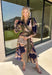 All the colors we love for fall come together in this printed midi dress from Entro. A mix of olive, navy, and tan creates a rich seasonal palette that feels right at home at autumn gatherings, family photos, and weekend plans. The v-neckline is accented with contrast stripe trim for a fun mix of prints, while long balloon sleeves add beautiful shape to the silhouette. A coordinating self-tie belt lets you define the waist, and convenient side pockets make it even easier to wear. 
