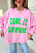 Add a little western attitude to your cozy season! This playful pink mock neck sweatshirt features a bold "Cool It, Cowboy" graphic in textured green striped lettering for the perfect mix of retro charm and everyday comfort. The ribbed neckline, cuffs, and hem give this fleece-lined pullover an elevated finish, making it a standout piece you'll love wearing on crisp fall days.