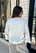 Show your Texas pride in the coziest way possible! This ash grey mock neck sweatshirt blends everyday comfort with timeless style, featuring "Texas" in soft script across the chest and a sweet heart detail on the sleeve. The fleece-lined interior keeps you warm and cozy, while the classic silhouette makes it an easy favorite for everything from football Saturdays and coffee runs to relaxed weekends at home. 
