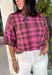 Add a cozy pop of pattern to your everyday wardrobe with this charming sweater from Entro. Designed in a pink and brown plaid knit, this short sleeve sweater is the perfect blend of classic style and seasonal warmth. The soft, cozy knit makes it comfortable enough for all-day wear, while the timeless plaid pattern adds effortless charm to any outfit. 