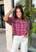 Add a cozy pop of pattern to your everyday wardrobe with this charming sweater from Entro. Designed in a pink and brown plaid knit, this short sleeve sweater is the perfect blend of classic style and seasonal warmth. The soft, cozy knit makes it comfortable enough for all-day wear, while the timeless plaid pattern adds effortless charm to any outfit. 