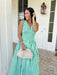 Fresh, crisp, and made for sunny days! This green and white stripe sleeveless midi dress brings a clean, classic look with just the right touch of femininity. The subtle ruffle detail along the sleeves adds a soft, playful feel, while the tailored silhouette keeps it polished and easy to wear. Designed with a hint of stretch and smocking along the back, this dress offers a comfortable, flattering fit. 