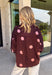 A classic polka dot blouse is a must-have for every fall wardrobe. Timeless and effortlessly polished, this collared top is designed with an easy silhouette that transitions seamlessly from the office to weekend outings. The button front, 3/4-length sleeves with button cuffs, and back pleat detail add elevated touches you'll appreciate, while the lightweight fabric keeps it comfortable all day long. Pair it with your favorite denim or tailored trousers for a look that never goes out of style.