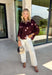 A classic polka dot blouse is a must-have for every fall wardrobe. Timeless and effortlessly polished, this collared top is designed with an easy silhouette that transitions seamlessly from the office to weekend outings. The button front, 3/4-length sleeves with button cuffs, and back pleat detail add elevated touches you'll appreciate, while the lightweight fabric keeps it comfortable all day long. Pair it with your favorite denim or tailored trousers for a look that never goes out of style.