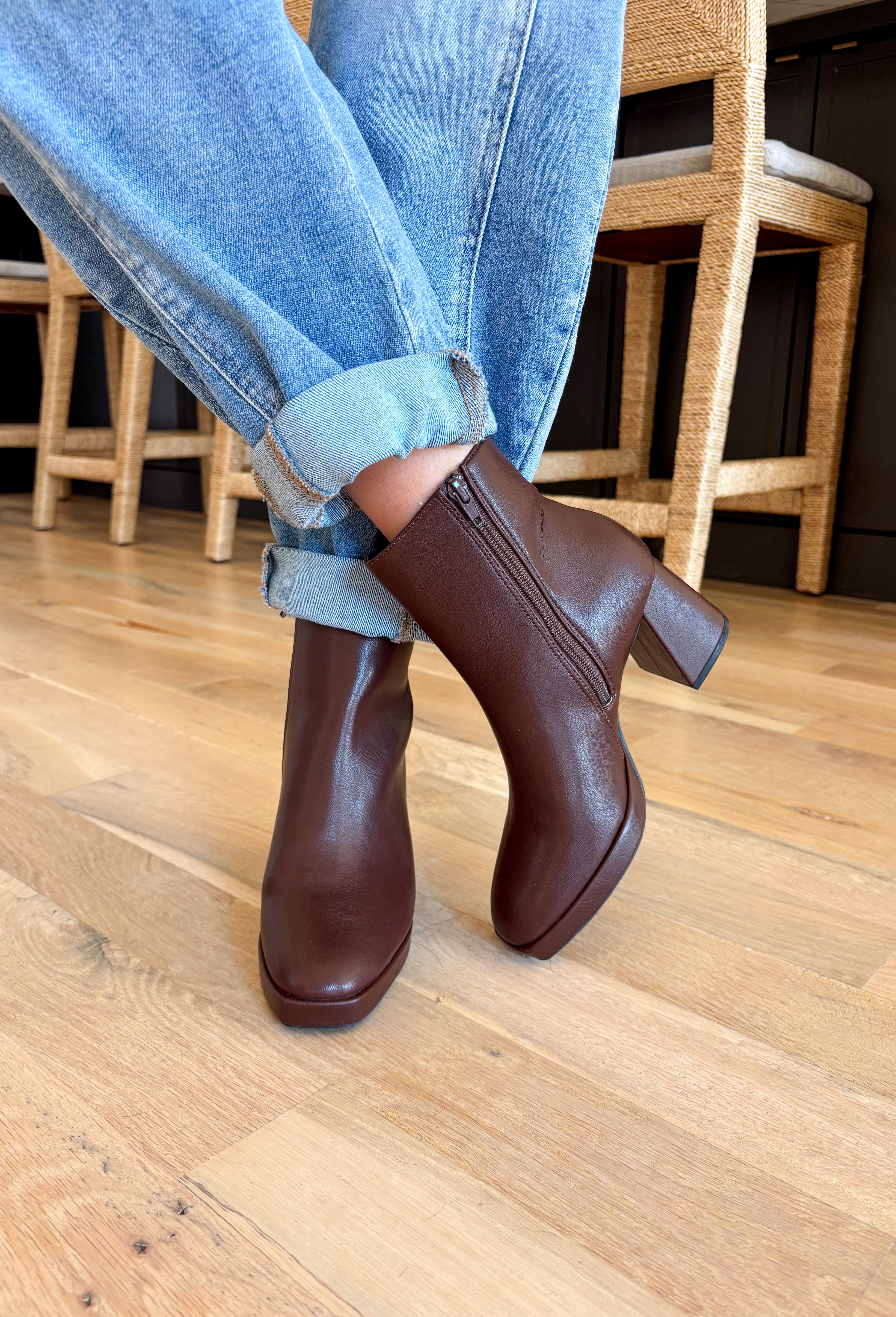 The Chinese Laundry Dodger Smoosh Brown Boots combine classic style with everyday comfort. Crafted in a versatile brown shade, these boots feature a sleek silhouette designed to complement a wide range of outfits. Their cushioned insoles provide lasting support, making them ideal for all-day wear. Durable construction ensures these boots maintain their shape and finish, while the textured sole enhances traction for stability. Perfect for both casual and dressier occasions, they offer a refined look with dep