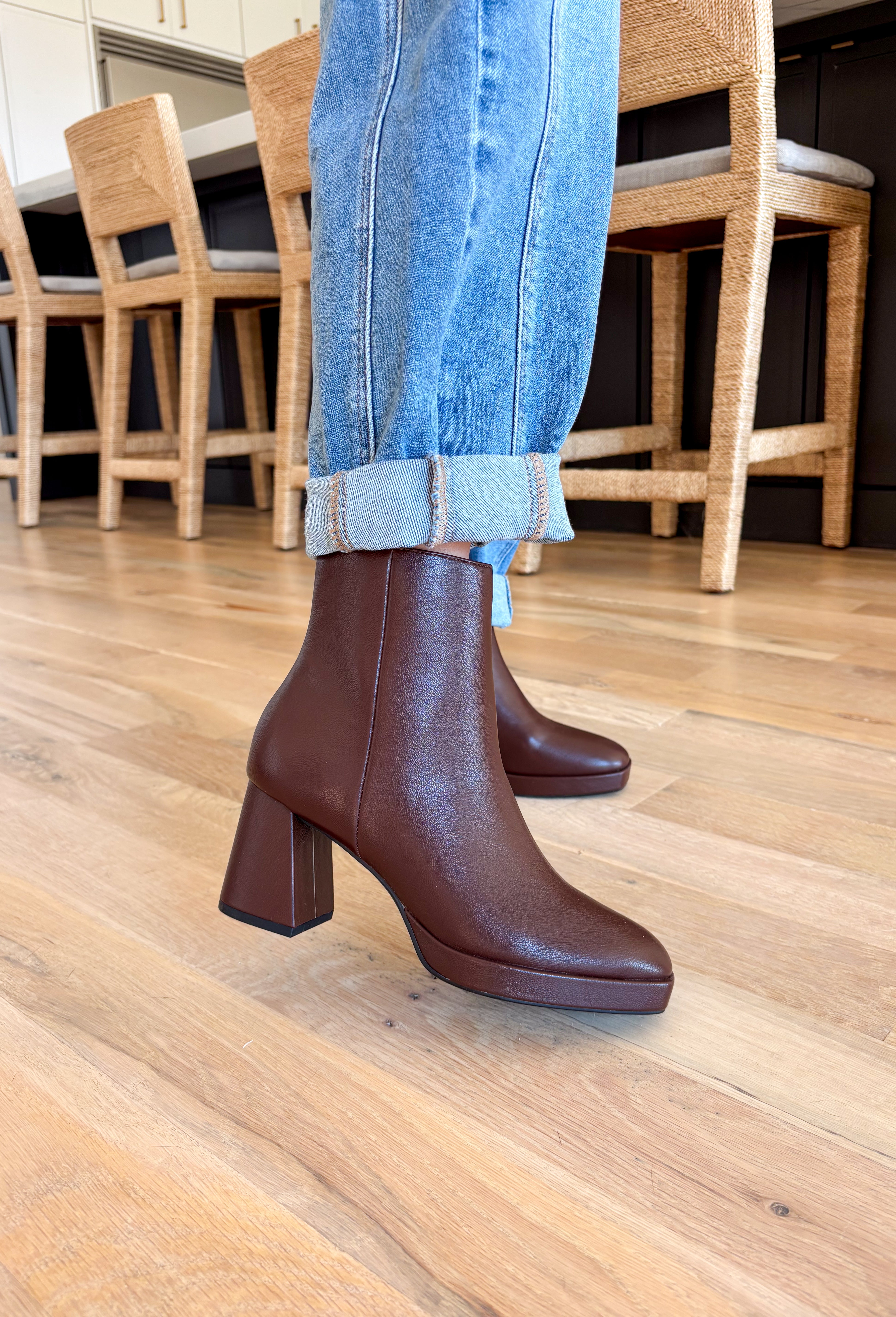 The Chinese Laundry Dodger Smoosh Brown Boots combine classic style with everyday comfort. Crafted in a versatile brown shade, these boots feature a sleek silhouette designed to complement a wide range of outfits. Their cushioned insoles provide lasting support, making them ideal for all-day wear. Durable construction ensures these boots maintain their shape and finish, while the textured sole enhances traction for stability. Perfect for both casual and dressier occasions, they offer a refined look with dep