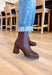 The Chinese Laundry Dodger Smoosh Brown Boots combine classic style with everyday comfort. Crafted in a versatile brown shade, these boots feature a sleek silhouette designed to complement a wide range of outfits. Their cushioned insoles provide lasting support, making them ideal for all-day wear. Durable construction ensures these boots maintain their shape and finish, while the textured sole enhances traction for stability. Perfect for both casual and dressier occasions, they offer a refined look with dep
