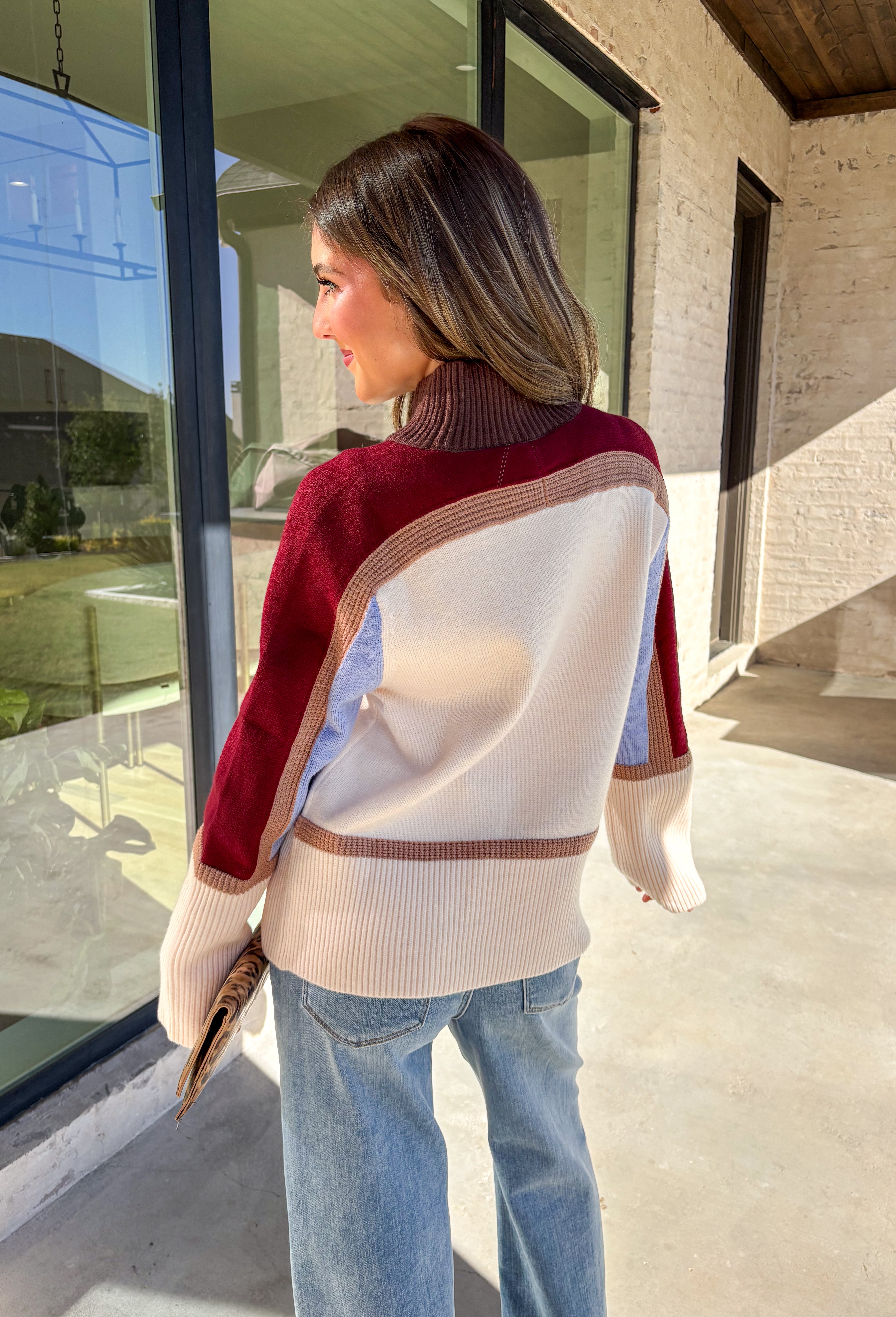 This neutral mock neck sweater by THML is the perfect mix of cozy comfort and colorful charm. With soft details in brown, tan, burgundy, and blue woven throughout, it adds just the right pop of pattern to your fall wardrobe. The mock neckline and relaxed fit make it easy to style for chilly days—whether you’re heading to brunch, a football game, or a cozy night in.