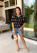 A little bold, a little bright, and totally spring-ready—this black short sleeve top by Entro is the perfect mix of classic and colorful. Featuring a patch floral embroidered print on the front with pops of green, blue, pink, and yellow, it adds beautiful texture and a fun burst of color against the solid black base. The back stays solid black for a clean contrast, and a keyhole closure adds a sweet finishing touch. 