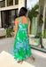 This green and blue botanical midi dress is the kind of piece that instantly makes you feel put together for summer! The vibrant print paired with gold button details gives it a polished, elevated look, while the belted waist creates a flattering silhouette. The smocked back adds comfort and flexibility, and the lightweight cotton keeps it breathable for warm days. Fully lined with pockets (always a win), it’s perfect for everything from brunch to special events. 