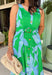 This green and blue botanical midi dress is the kind of piece that instantly makes you feel put together for summer! The vibrant print paired with gold button details gives it a polished, elevated look, while the belted waist creates a flattering silhouette. The smocked back adds comfort and flexibility, and the lightweight cotton keeps it breathable for warm days. Fully lined with pockets (always a win), it’s perfect for everything from brunch to special events. 