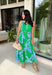 This green and blue botanical midi dress is the kind of piece that instantly makes you feel put together for summer! The vibrant print paired with gold button details gives it a polished, elevated look, while the belted waist creates a flattering silhouette. The smocked back adds comfort and flexibility, and the lightweight cotton keeps it breathable for warm days. Fully lined with pockets (always a win), it’s perfect for everything from brunch to special events. 