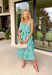 Fresh, playful, and made for sunny spring days, this green and white striped sleeveless midi dress is an effortless standout. The bold large stripe print gives it that classic, crisp look, while the smaller stripe pattern on the adjustable self-tie sleeves and along the front adds a fun contrast detail. Smocking along the back creates a comfortable, flattering fit, and side pockets make it even better (because we love a dress that’s cute and practical). Fully lined and breathable in cotton.