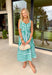 Fresh, playful, and made for sunny spring days, this green and white striped sleeveless midi dress is an effortless standout. The bold large stripe print gives it that classic, crisp look, while the smaller stripe pattern on the adjustable self-tie sleeves and along the front adds a fun contrast detail. Smocking along the back creates a comfortable, flattering fit, and side pockets make it even better (because we love a dress that’s cute and practical). Fully lined and breathable in cotton.