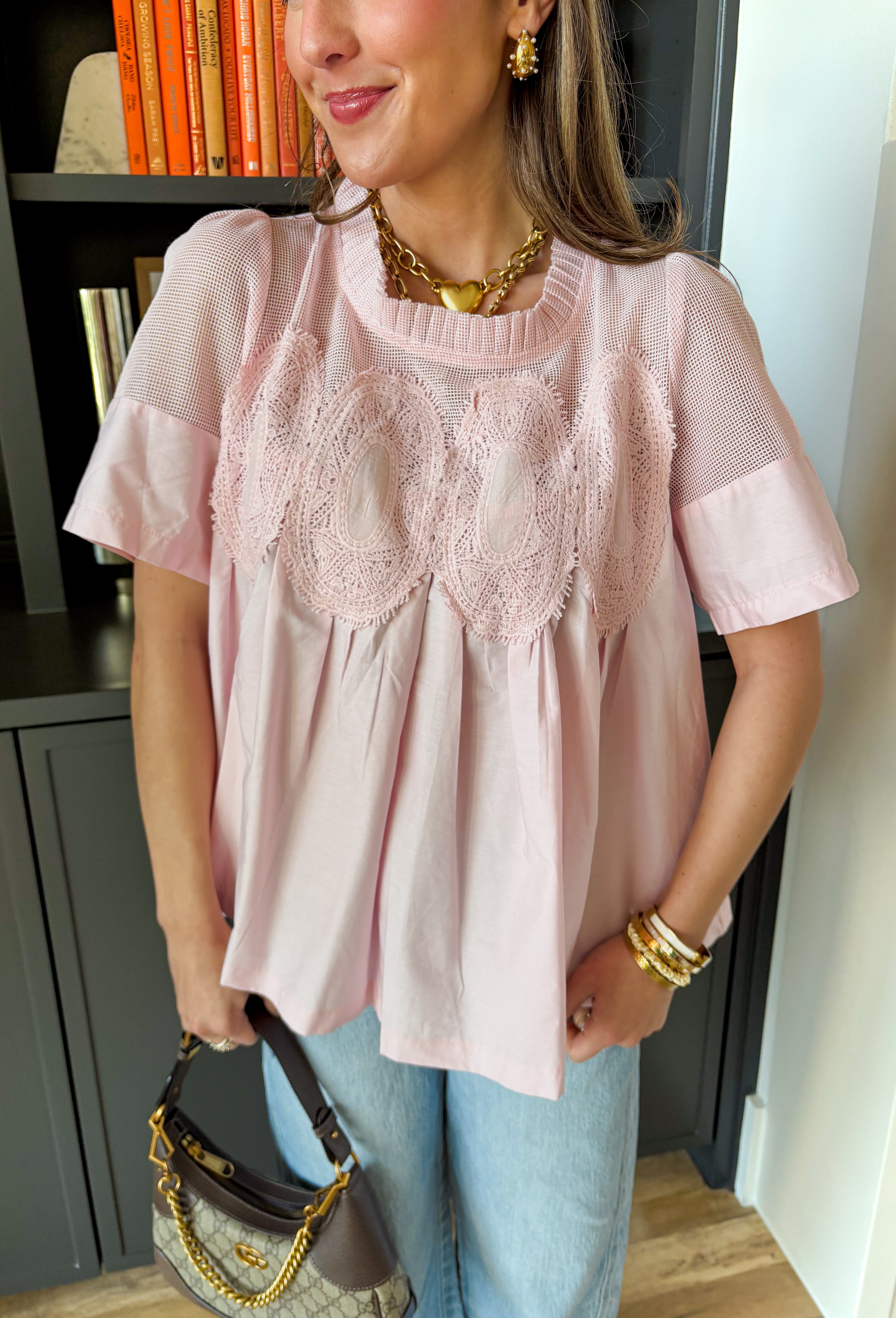 A little texture goes a long way! This short sleeve baby pink top by Fate combines soft cotton with airy mesh and delicate appliqué details for a unique, elevated twist on a classic top. Lightweight, breathable, and endlessly versatile, it’s the perfect piece to dress up or down, making it a year-round favorite for everything from coffee runs to casual dinners.