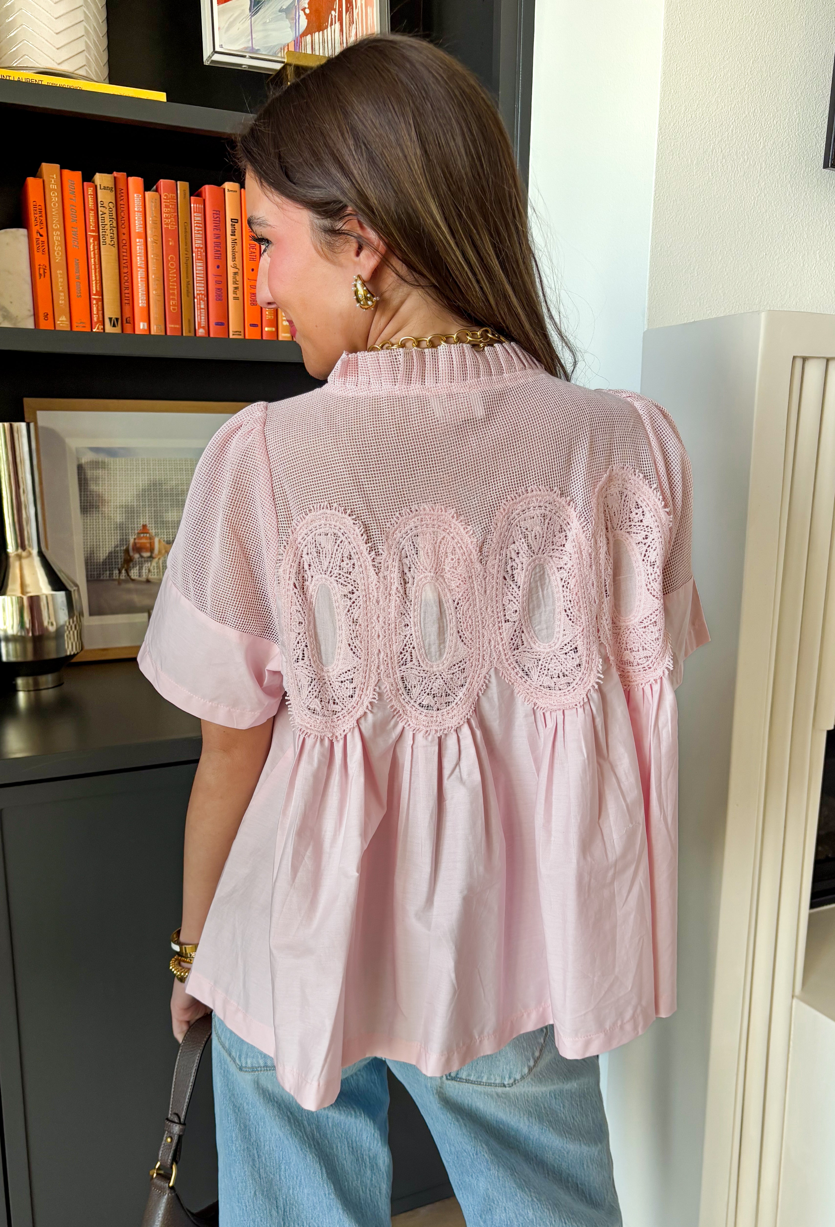 A little texture goes a long way! This short sleeve baby pink top by Fate combines soft cotton with airy mesh and delicate appliqué details for a unique, elevated twist on a classic top. Lightweight, breathable, and endlessly versatile, it’s the perfect piece to dress up or down, making it a year-round favorite for everything from coffee runs to casual dinners.
