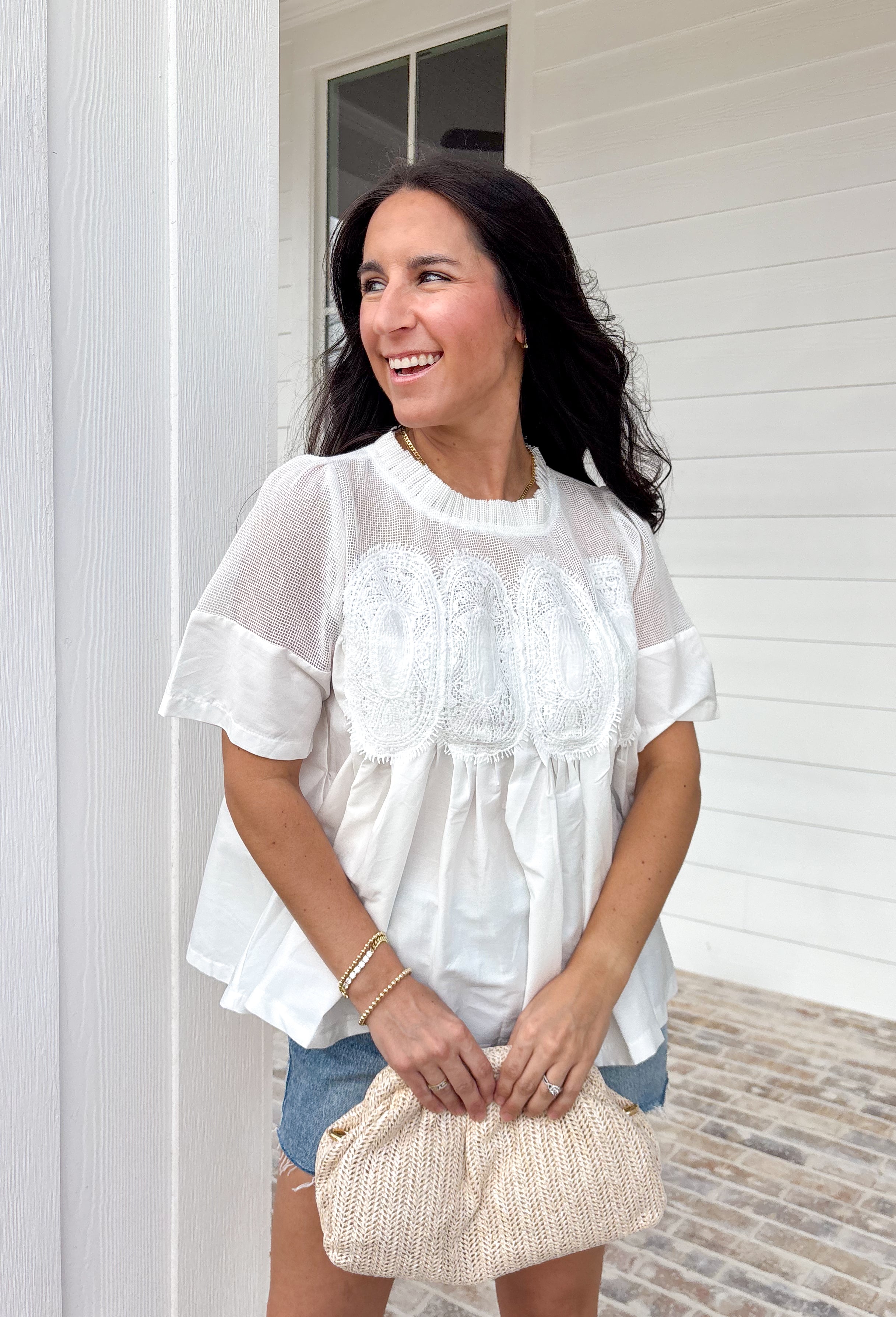 A little texture goes a long way! This short sleeve white top by Fate combines soft cotton with airy mesh and delicate appliqué details for a unique, elevated twist on a classic top. Lightweight, breathable, and endlessly versatile, it’s the perfect piece to dress up or down, making it a year-round favorite for everything from coffee runs to casual dinners.