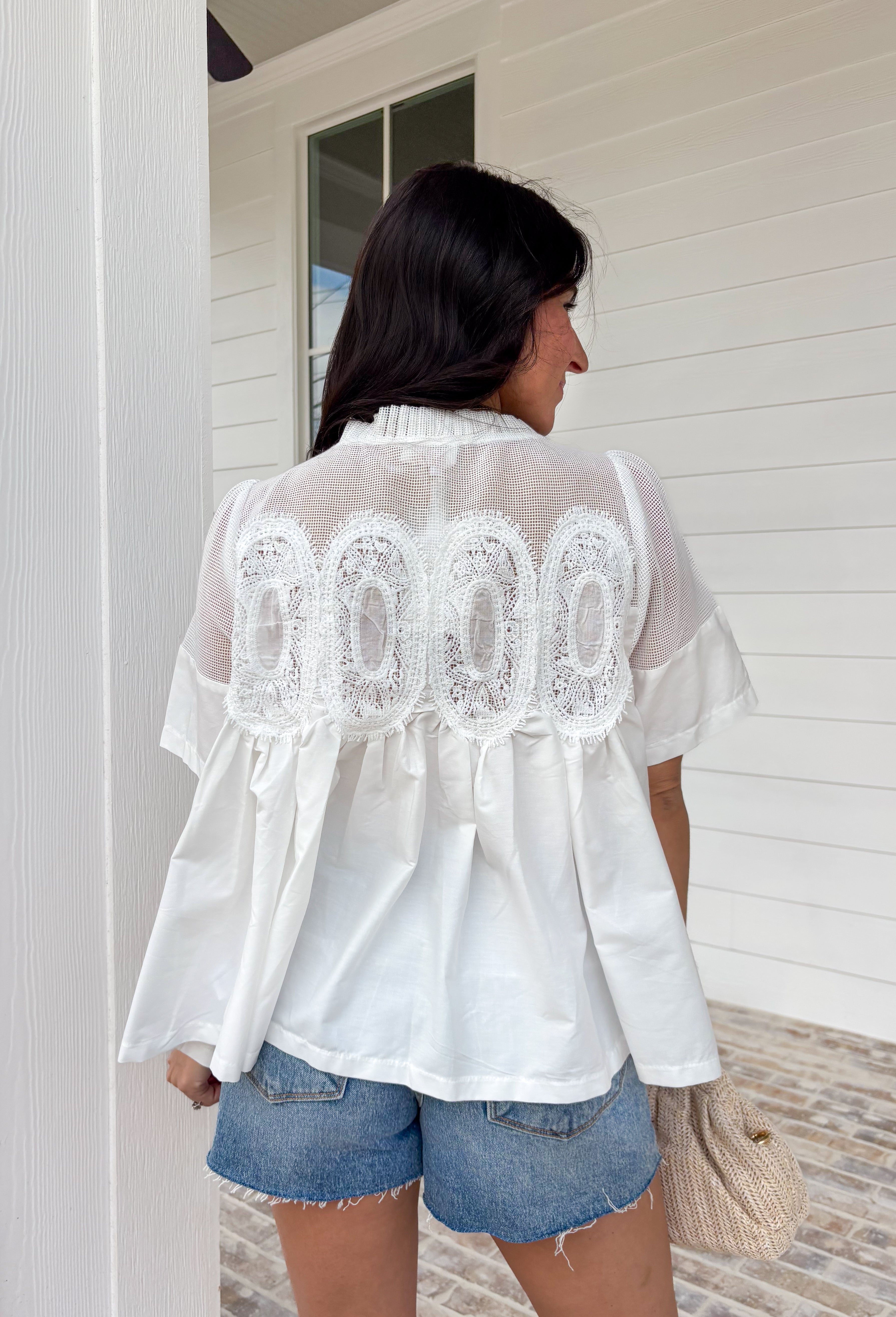 A little texture goes a long way! This short sleeve white top by Fate combines soft cotton with airy mesh and delicate appliqué details for a unique, elevated twist on a classic top. Lightweight, breathable, and endlessly versatile, it’s the perfect piece to dress up or down, making it a year-round favorite for everything from coffee runs to casual dinners.