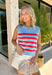This light blue striped sweater tank is the perfect mix of classic and festive for summer! Featuring a red stripe print, it’s a subtle nod to patriotic style—perfect for the 4th of July and all your warm-weather plans. The ribbed crew neckline and hem give it a clean, polished look, while the functional gold button details along the sides add an elevated, eye-catching touch. Made from breathable cotton, it’s lightweight and easy to wear from day to night.