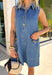 This sleeveless denim mini dress is the perfect mix of classic and cool for summer. Designed with a button front and front flap pockets featuring buckle accents, it brings a subtle utility vibe that feels both trendy and timeless. The lightweight cotton keeps it breathable for warm days, while the structured shape makes it easy to dress up or down. Whether you're heading to brunch, running errands, or packing for vacation, this is one of those throw-on-and-go pieces that always works. 