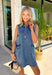 This sleeveless denim mini dress is the perfect mix of classic and cool for summer. Designed with a button front and front flap pockets featuring buckle accents, it brings a subtle utility vibe that feels both trendy and timeless. The lightweight cotton keeps it breathable for warm days, while the structured shape makes it easy to dress up or down. Whether you're heading to brunch, running errands, or packing for vacation, this is one of those throw-on-and-go pieces that always works. 