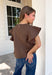 Simple details make all the difference in this effortlessly beautiful brown top! Crafted from a breathable cotton and linen blend, this timeless top is perfect for transitioning through the fall season. The flattering v-neckline is accented with delicate stitch detailing, while flutter sleeves add a soft, feminine touch. A button closure at the back completes the look with subtle charm. 