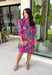 Make every occasion feel a little more special in this beautifully detailed dress from Entro. Featuring a stunning abstract print in rich shades of magenta, olive, navy, and pink, this feminine dress is full of eye-catching seasonal color. The ruffled mock neckline and button-front design create a timeless silhouette, while the matching self-tie belt flatters your waist for a customizable fit. Puff sleeves with elastic ruffle cuffs add a sweet finishing touch, and side pockets make it as practical.