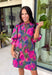 Make every occasion feel a little more special in this beautifully detailed dress from Entro. Featuring a stunning abstract print in rich shades of magenta, olive, navy, and pink, this feminine dress is full of eye-catching seasonal color. The ruffled mock neckline and button-front design create a timeless silhouette, while the matching self-tie belt flatters your waist for a customizable fit. Puff sleeves with elastic ruffle cuffs add a sweet finishing touch, and side pockets make it as practical.