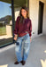 A cozy sweater with a little extra personality! This rich plum sweater features contrasting mauve exposed hems that add a soft, lived-in touch to the classic silhouette. The ribbed hem and sleeves create a comfortable fit while giving the sweater just the right amount of texture. Easy to style and perfect for chilly days, this cozy knit will quickly become a favorite for coffee runs, casual weekends, and fall outings.