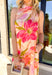 This sleeveless midi dress is made for the moments you want to feel extra special! Featuring a stunning abstract floral print in peach, shades of pink, lilac, and green, it’s soft, romantic, and effortlessly eye-catching. The halter neckline adds a flattering, elevated touch, while the tie closure at the back keeps the look delicate and feminine. Fully lined for comfortable wear and finished with side pockets.