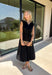 Meet your new throw-on-and-go favorite with this black utility-inspired midi dress from Entro. The classic black color keeps it versatile, while the zipper-front closure and adjustable waist give it a sporty, modern feel. A bubble hem adds shape and a fun unexpected finish, while the sleeveless silhouette makes it easy to wear now and layer as the temperatures cool down. Complete with convenient side pockets, this dress is ready for busy workdays, weekend plans, travel days, and everything in between.