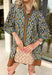 Chic and full of seasonal charm, this hunter green mini dress by Entro brings a fresh take on winter dressing. Featuring a geometric print in tan, white, brown, and lavender, it adds a modern twist to your cold-weather wardrobe. The contrast binding and ruffle hem offer feminine flair, while the lined design and side pocket make it as comfortable as it is stylish.