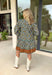 Chic and full of seasonal charm, this hunter green mini dress by Entro brings a fresh take on winter dressing. Featuring a geometric print in tan, white, brown, and lavender, it adds a modern twist to your cold-weather wardrobe. The contrast binding and ruffle hem offer feminine flair, while the lined design and side pocket make it as comfortable as it is stylish.