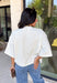 Cozy, classic, and endlessly versatile, this button-down cardigan from Double Zero is the perfect layering piece for the season. Designed in a neutral whip cream hue, this soft knit cardigan is easy to style with everything from denim to dresses. The ribbed neckline adds a timeless touch, while the cozy knit construction keeps you comfortable throughout the day. Wear it buttoned as a sweater or open over your favorite basics for an effortlessly polished fall look.