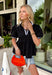 This black babydoll top is the perfect blend of playful and polished for the fall season! The black color is classic, while the crisp white contrast trim along the collar, front, and sleeves adds a classic touch that never goes out of style. Puff sleeves and the relaxed babydoll silhouette create an easy, flattering fit you'll love for busy days and weekend plans alike. Made from breathable cotton, it's comfortable enough for all-day wear and easy to layer.