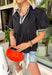 This black babydoll top is the perfect blend of playful and polished for the fall season! The black color is classic, while the crisp white contrast trim along the collar, front, and sleeves adds a classic touch that never goes out of style. Puff sleeves and the relaxed babydoll silhouette create an easy, flattering fit you'll love for busy days and weekend plans alike. Made from breathable cotton, it's comfortable enough for all-day wear and easy to layer.