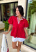 This red babydoll top is the perfect blend of playful and polished for the fall season! The rich red color makes a statement, while the crisp white contrast trim along the collar, front, and sleeves adds a classic touch that never goes out of style. Puff sleeves and the relaxed babydoll silhouette create an easy, flattering fit you'll love for busy days and weekend plans alike. Made from breathable cotton, it's comfortable enough for all-day wear and easy to layer under a denim jacket.